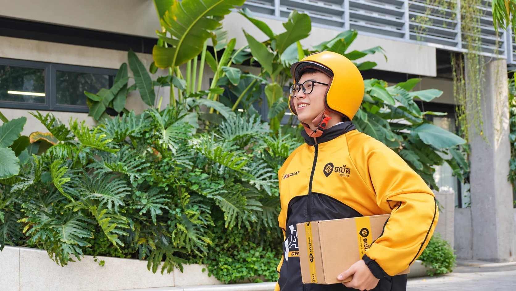 Jalat delivery partner carrying a secured parcel